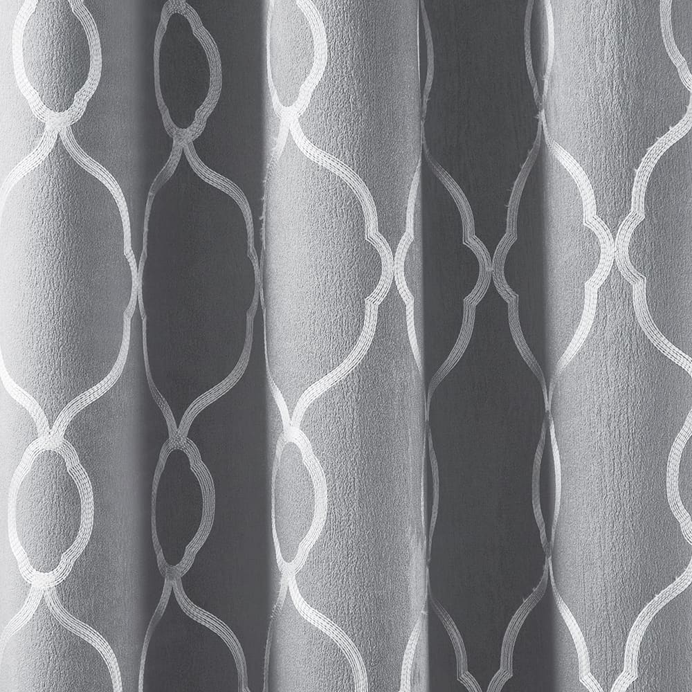The folds of a Alona Lattice dark grey panel, close up