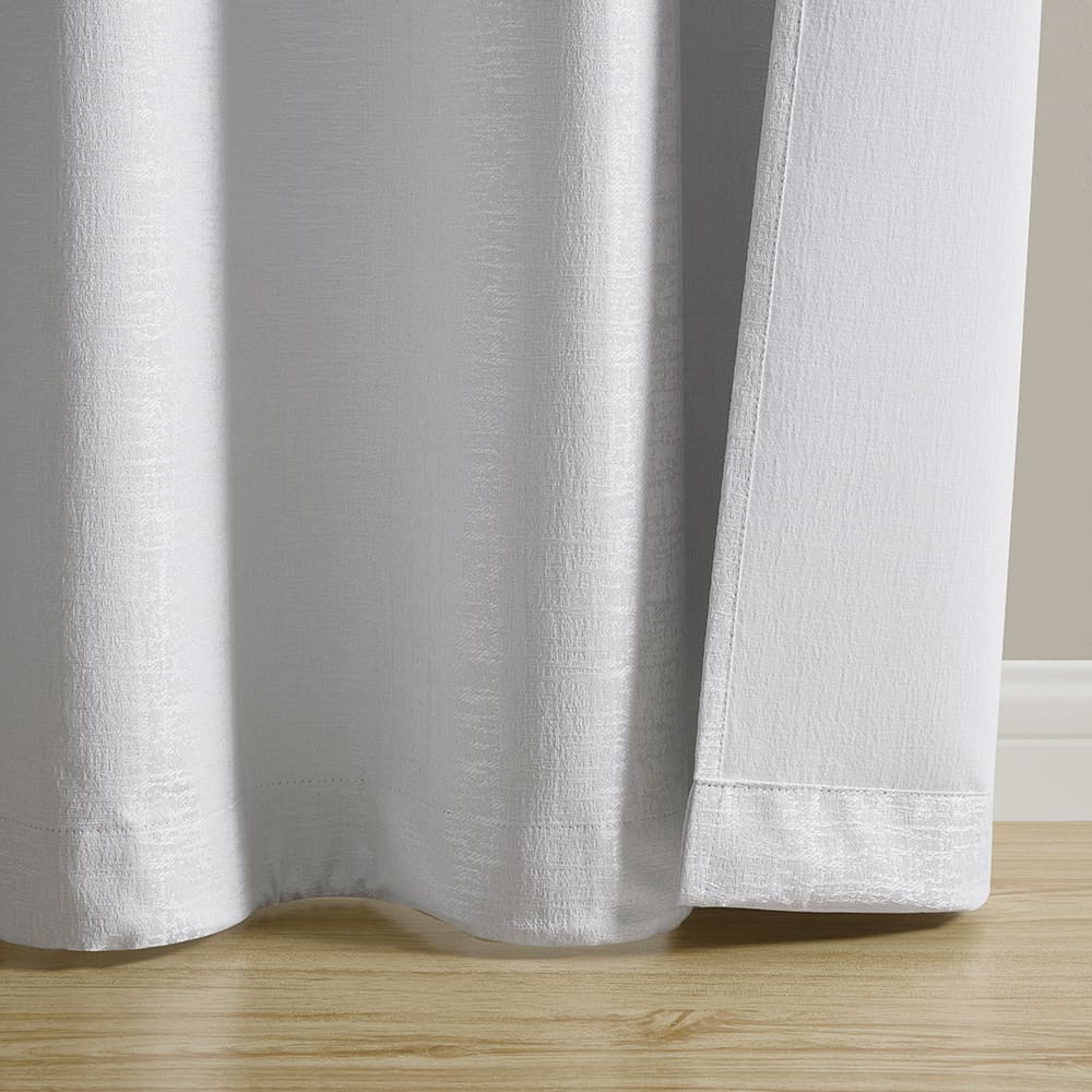 The bottom of a Paloma white panel where it meets the floor