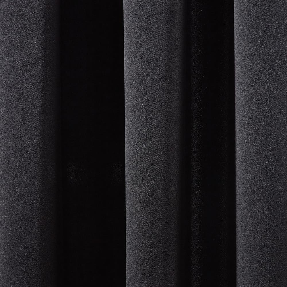 The folds of a Savoy black panel, close up