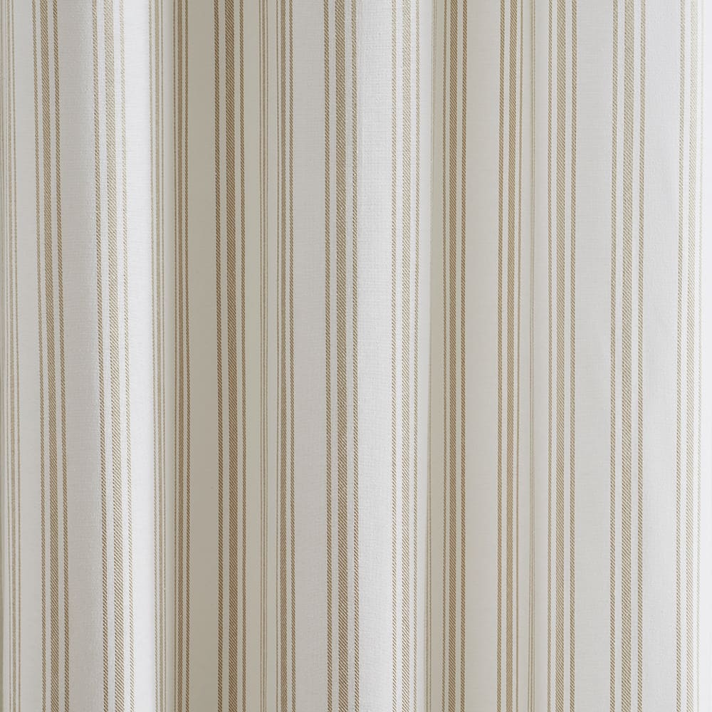 The folds of a Ticking Stripe stripe panel, close up