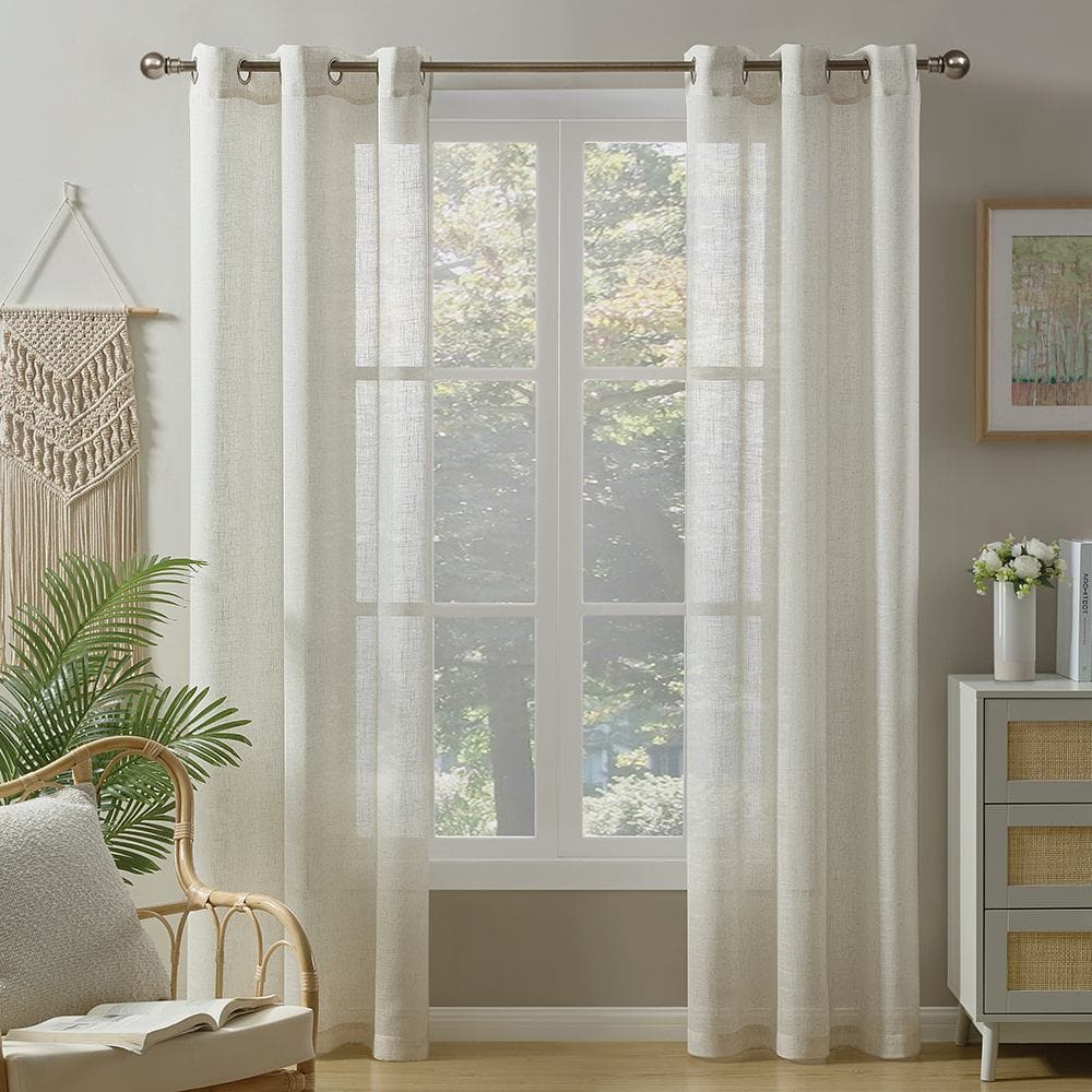 Valencia linen blend light filtering panels in natural on grommets at a window
