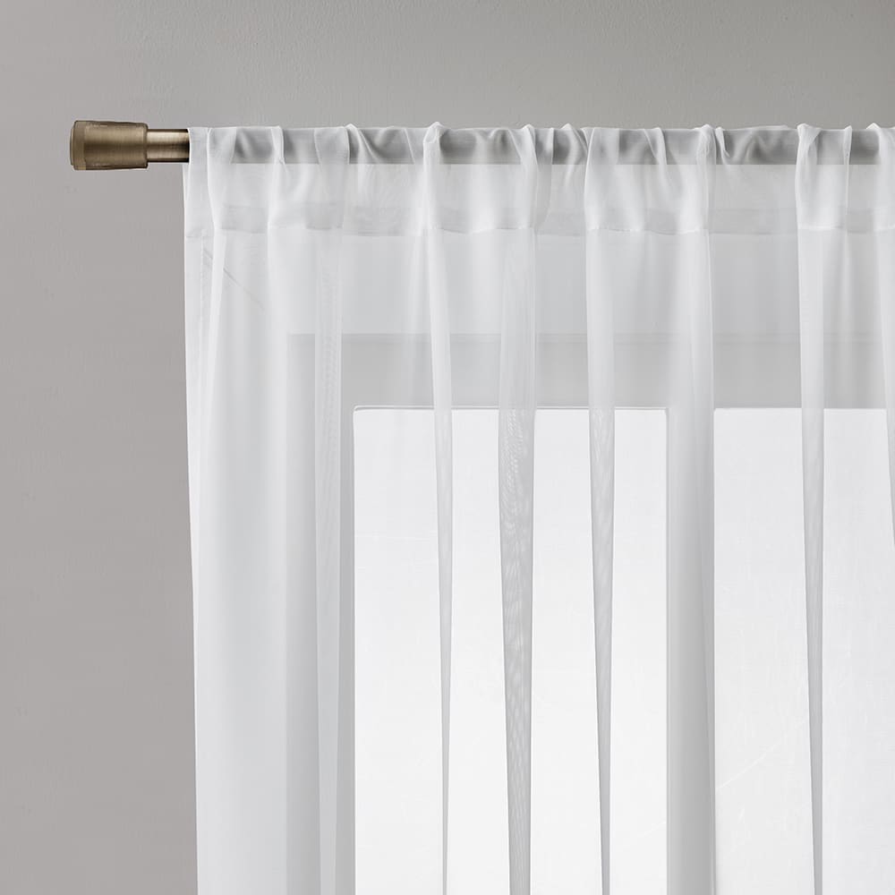 Close-up of the top of a Voile white panel on its rod